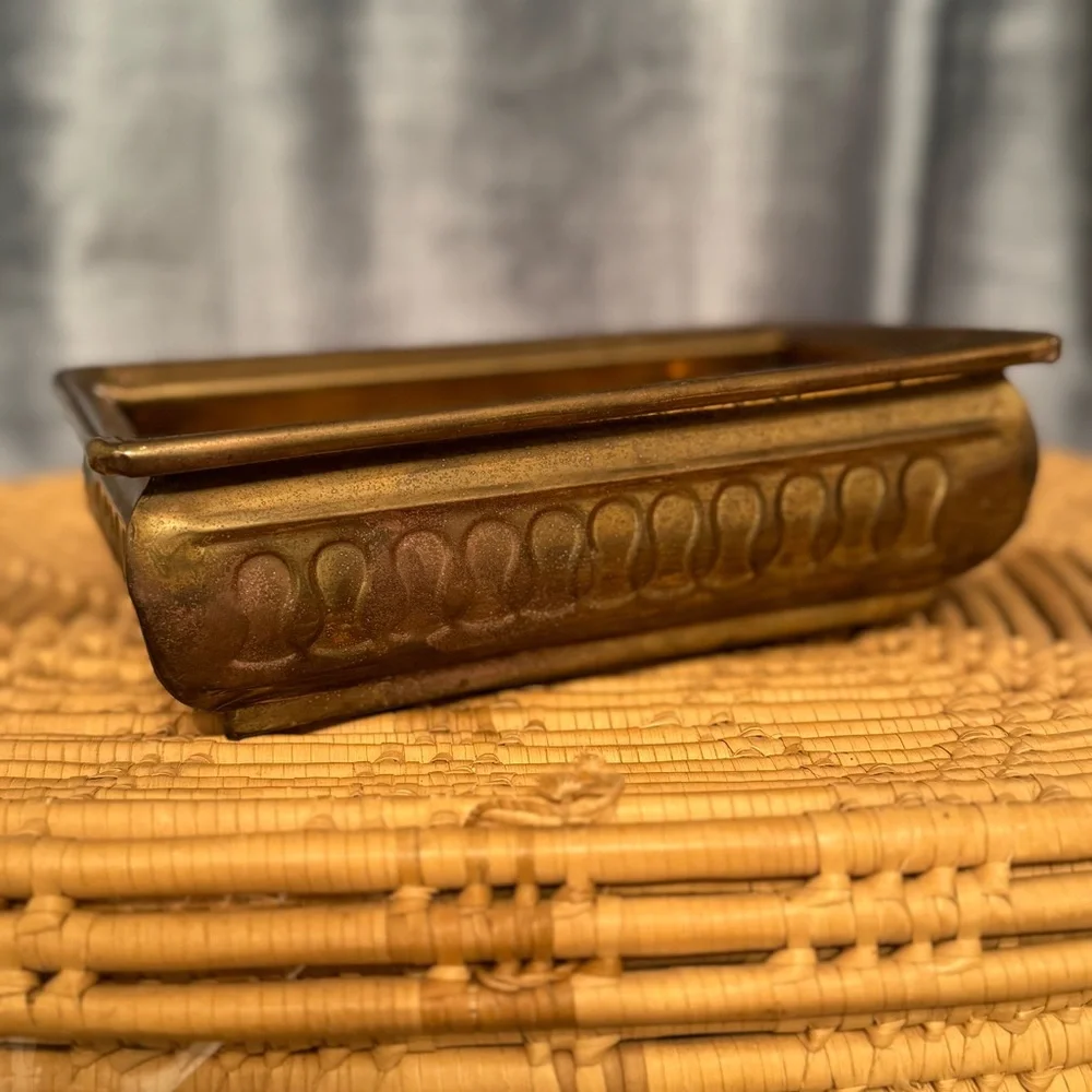 vintage brass planter, also known as a jardinière or cachepot.